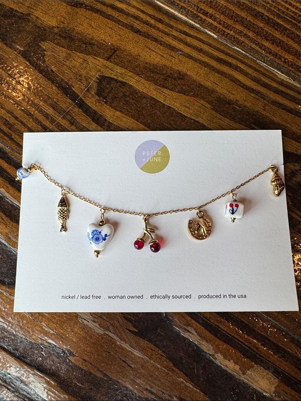 Gold Charm Bracelet with Red, White and Blue Enamel Accents